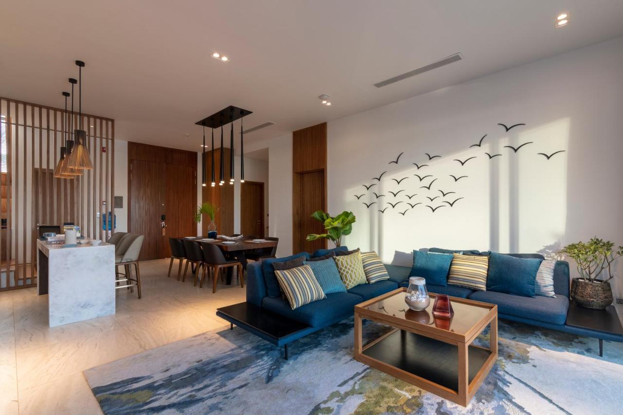 Moevenpick Villas & Residences Дуонг-Донг Экстерьер фото A living room in a condominium